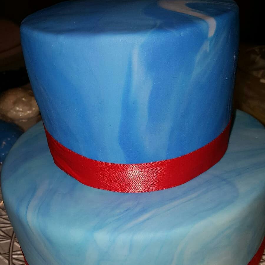 Two tier, marbled blue fondant cake