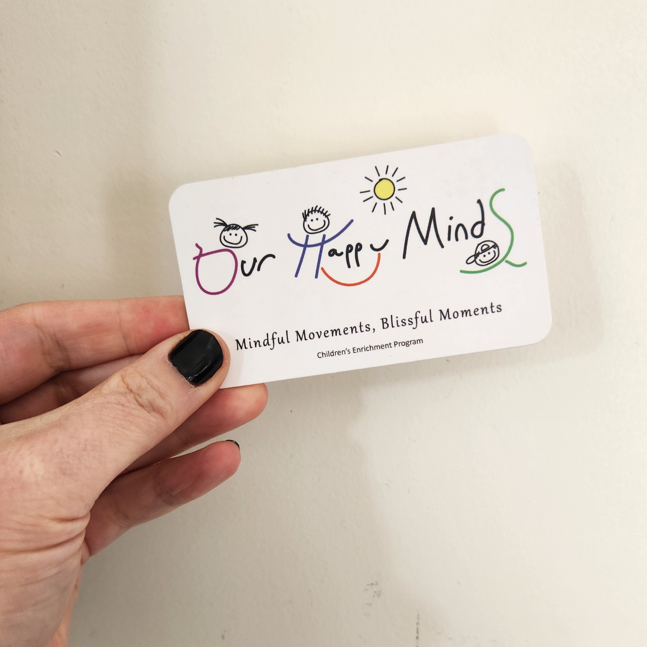 Our Happy Minds' business card
